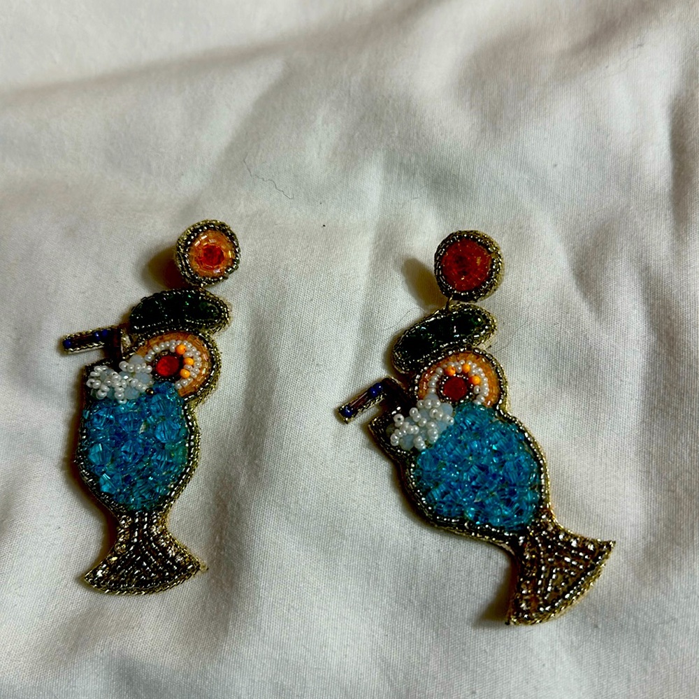 Beaded earrings sewn on cloth
